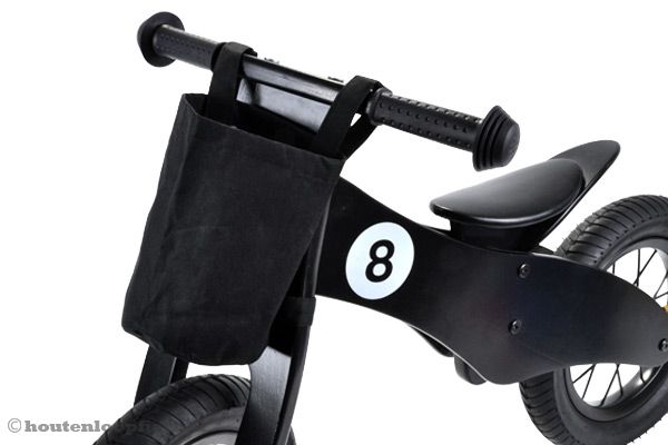 Past op het stuur van je houten loopfiets.